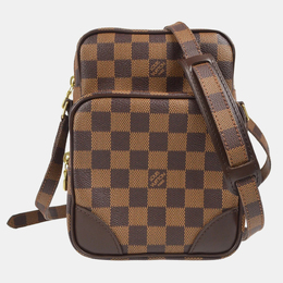 Louis Vuitton: Коричневая сумка через плечо 