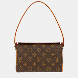 Louis Vuitton: Коричневая сумка 