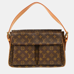 Louis Vuitton: Коричневая сумка 