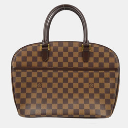 Louis Vuitton: Коричневая сумка 