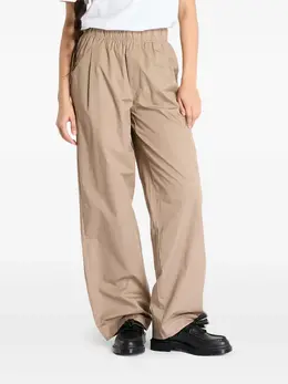 Calvin Klein Jeans: Бежевые брюки 