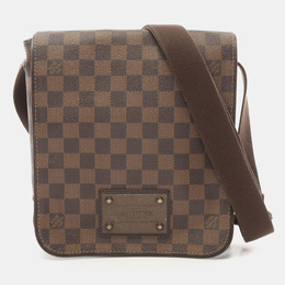 Louis Vuitton: Коричневая сумка 