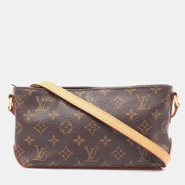 Louis Vuitton: Коричневая сумка 