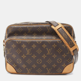 Louis Vuitton: Коричневая сумка 