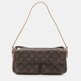 Louis Vuitton: Коричневая сумка 
