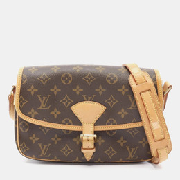 Louis Vuitton: Коричневая сумка 