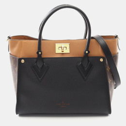 Louis Vuitton: Чёрная сумка 