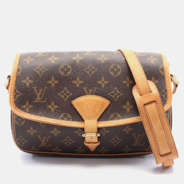 Louis Vuitton: Коричневая сумка 