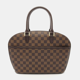 Louis Vuitton: Коричневая сумка 
