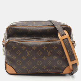 Louis Vuitton: Коричневая сумка 