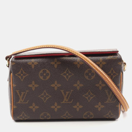 Louis Vuitton: Коричневая сумка 