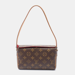 Louis Vuitton: Коричневая сумка 