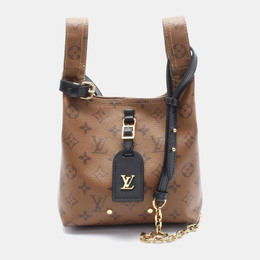 Louis Vuitton: Коричневая сумка через плечо 