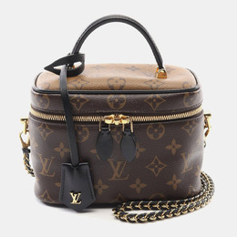 Louis Vuitton: Коричневая сумка через плечо 