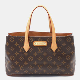 Louis Vuitton: Коричневая сумка 
