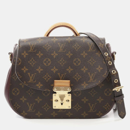 Louis Vuitton: Коричневая сумка 