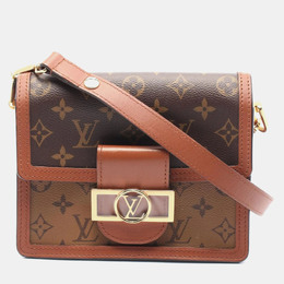 Louis Vuitton: Коричневая сумка 