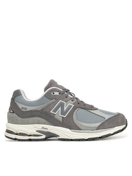 New Balance: Серые кроссовки 