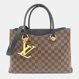 Louis Vuitton: Коричневая сумка 