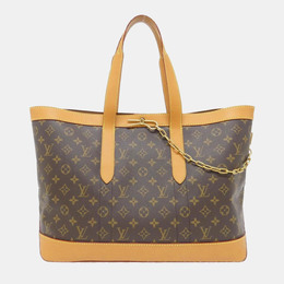 Louis Vuitton: Коричневая сумка 