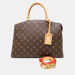 Louis Vuitton: Коричневая сумка 