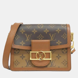 Louis Vuitton: Коричневая сумка 