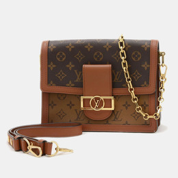 Louis Vuitton: Коричневая сумка 