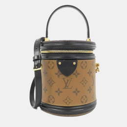 Louis Vuitton: Коричневая сумка 