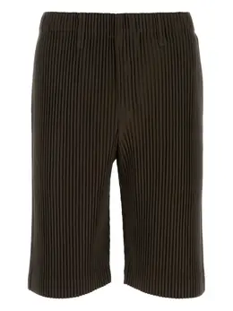 Homme Plissé Issey Miyake: Тёмные шорты 