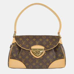 Louis Vuitton: Коричневая сумка 