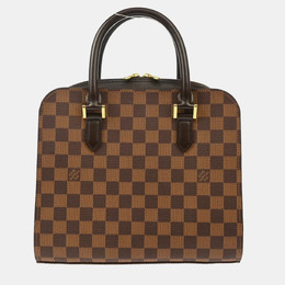 Louis Vuitton: Коричневая сумка 