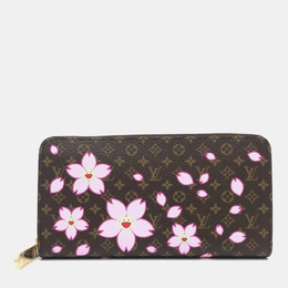 Louis Vuitton: Коричневый кошелёк  Zippy