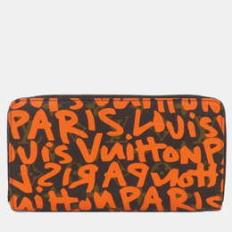 Louis Vuitton: Оранжевый кошелёк  Zippy