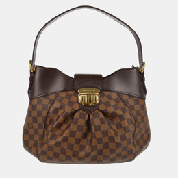 Louis Vuitton: Коричневая сумка 