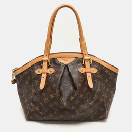 Louis Vuitton: Коричневая сумка 