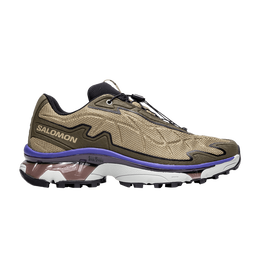 Salomon: Зелёные кроссовки 