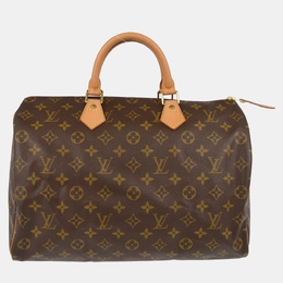 Louis Vuitton: Коричневая сумка  Speedy
