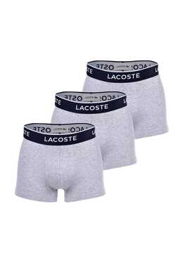 Lacoste: Серебристые брюки 