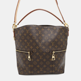 Louis Vuitton: Коричневая сумка 