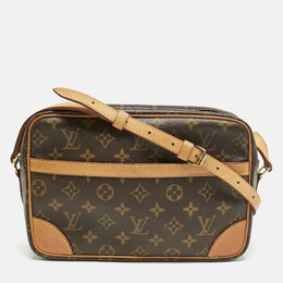 Louis Vuitton: Коричневая сумка 
