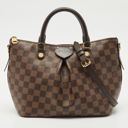 Louis Vuitton: Коричневая сумка 