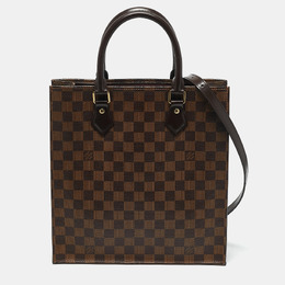 Louis Vuitton: Коричневая сумка 