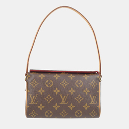 Louis Vuitton: Коричневая сумка 