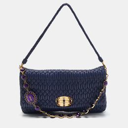 Miu Miu: Фиолетовая сумка 