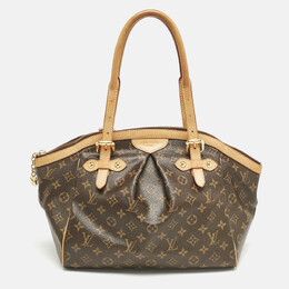 Louis Vuitton: Коричневая сумка 