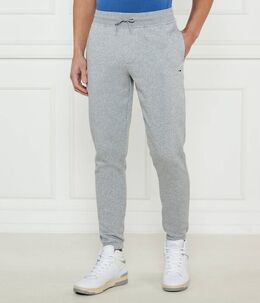 Tommy Jeans: Серые брюки 