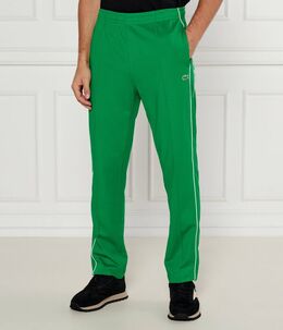 Lacoste: Зелёные брюки 