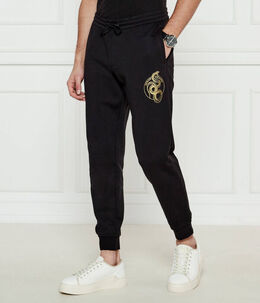 Armani Exchange: Чёрные брюки 