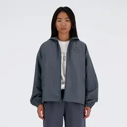 New Balance: Серая куртка 