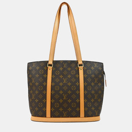 Louis Vuitton: Коричневая сумка 